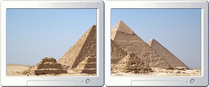The Gizah pyramids stretched across a two-monitor setup, accounting for the gap between the monitors